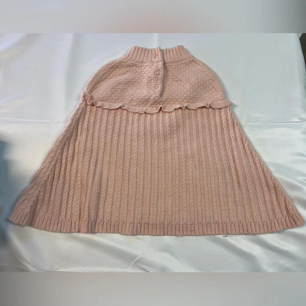Pink Knit poncho wool blend with chocolate brown out lined pockets. Girls size 6